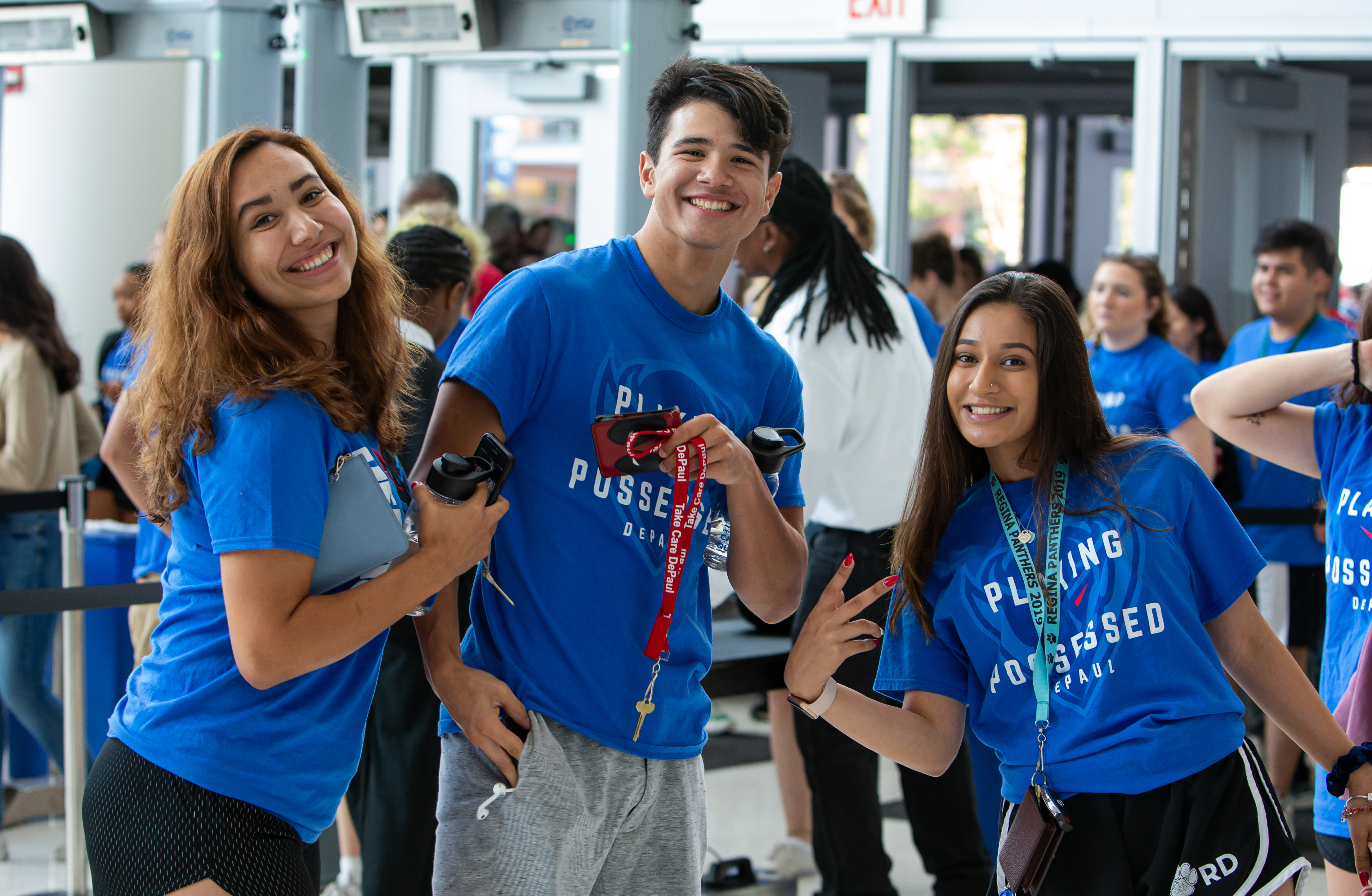 New DePaul students stop for a photo on their way in to Wintrust Arena for the first student convocation. (DePaul University/Randall Spriggs)